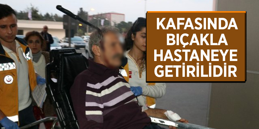 Üvey babasının kafasına ekmek bıçağı sapladı