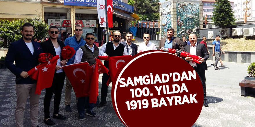 SAMGİAD esnafa bayrak dağıttı