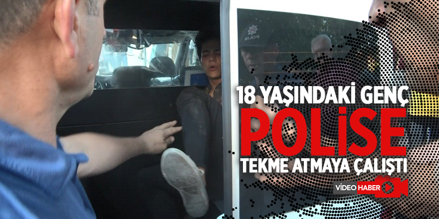 Kimliğini göstermek istemeyen genç polise tekme attı