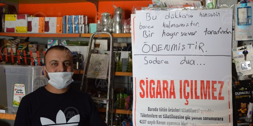 Samsun'da bir hayırsever iki bakkalın veresiye defterindeki yaklaşık 20 bin lira borcu ödedi