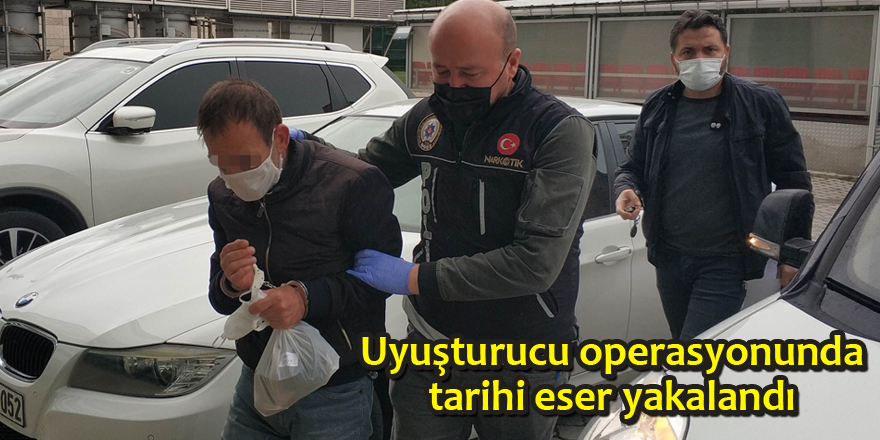 Evinde uyuşturucu ve tarihi eserle yakalandı