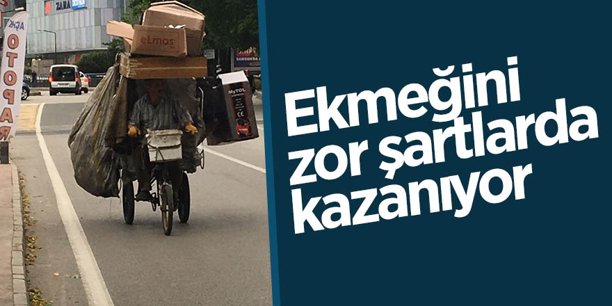 Ekmeğini zor şartlarda kazanıyor 