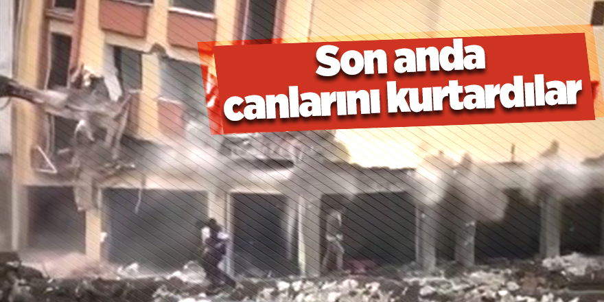 Afet bölgesinde yıkılan binanın altında kalmaktan son arda kurtuldular