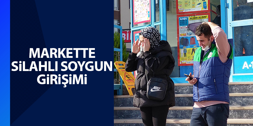 Markette silahlı soygun girişimi