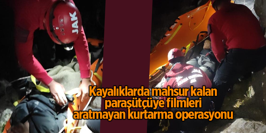 Kayalıklarda mahsur kalan paraşütçüye filmleri aratmayan kurtarma operasyonu