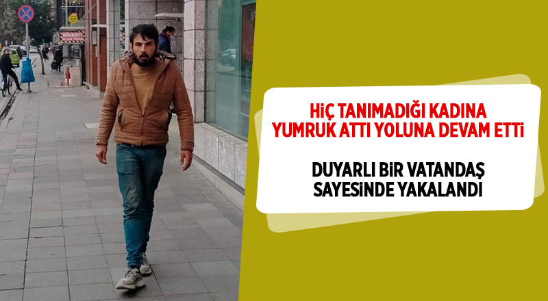 Hiç tanımadığı kadına yumruk attı yoluna devam etti