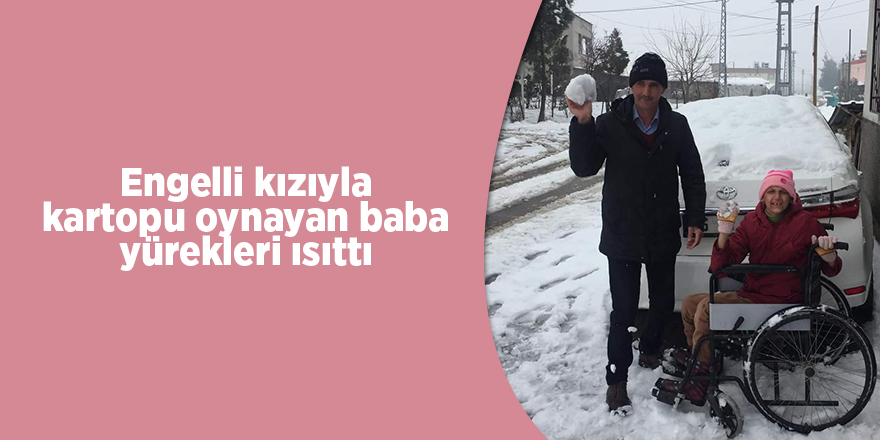 Engelli kızıyla kartopu oynayan baba yürekleri ısıttı