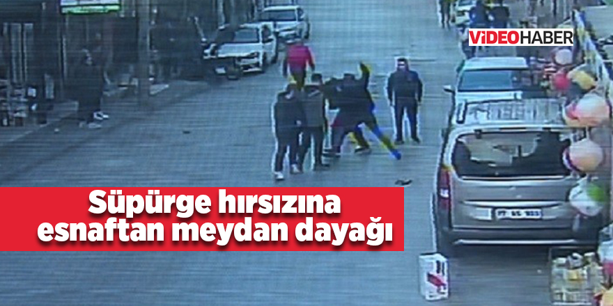 Süpürge hırsızına esnaftan meydan dayağı