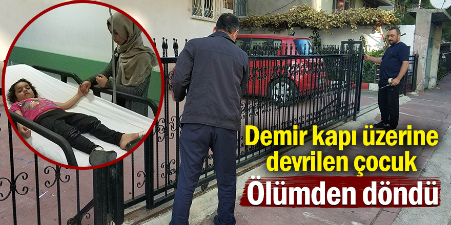 Demir bahçe kapısı üzerine devrilen çocuk ölümden döndü