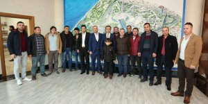 Genç, apartman görevlilerini ağırladı