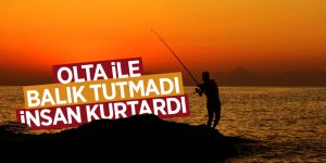 Denize atlayan adamı oltayla kurtardı