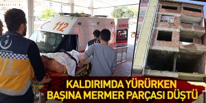 Kaldırımda yürürken başına mermer parçası düştü