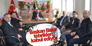 Başkan Bakır tebrikleri kabul ediyor