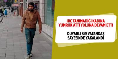 Hiç tanımadığı kadına yumruk attı yoluna devam etti