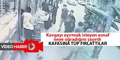 Kavgayı ayırmak isteyen esnaf neye uğradığını şaşırdı  Kafasına tüp fırlattılar