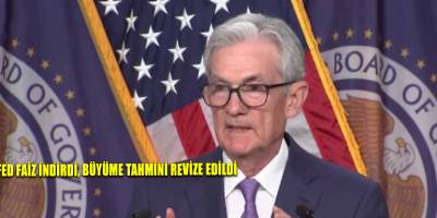 Fed faiz indirdi, büyüme tahmini revize edildi